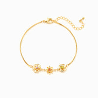 Gouden armband met 3D geboortebloemen en kleurrijke stenen