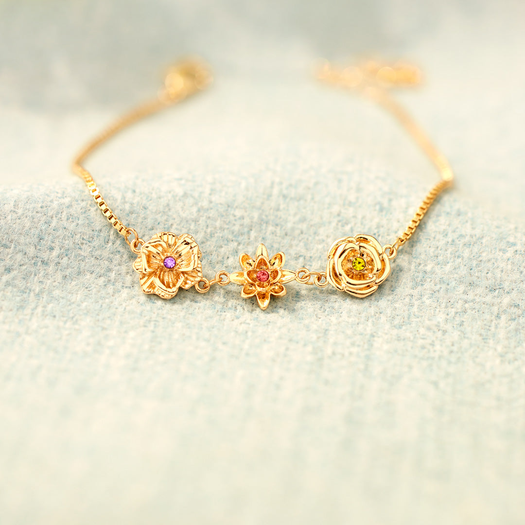 Gouden armband met 3D geboortebloemen en kleurrijke stenen