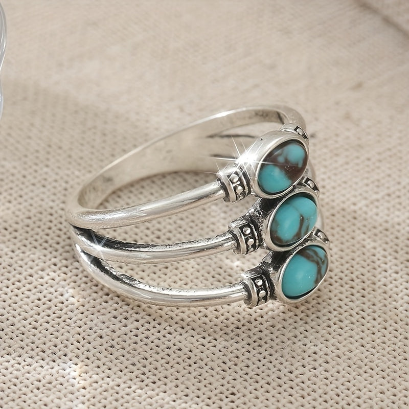 Zilveren bohemian ring met drie turquoise stenen