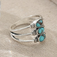 Zilveren bohemian ring met drie turquoise stenen