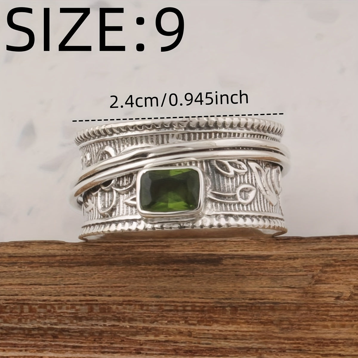 Zilveren brede ring met groene edelsteen