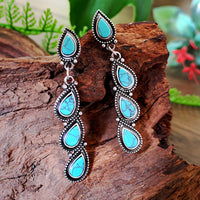 Zilveren vintage oorbellen met turquoise druppels