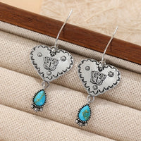 Zilveren vintage oorbellen met turquoise filigrein