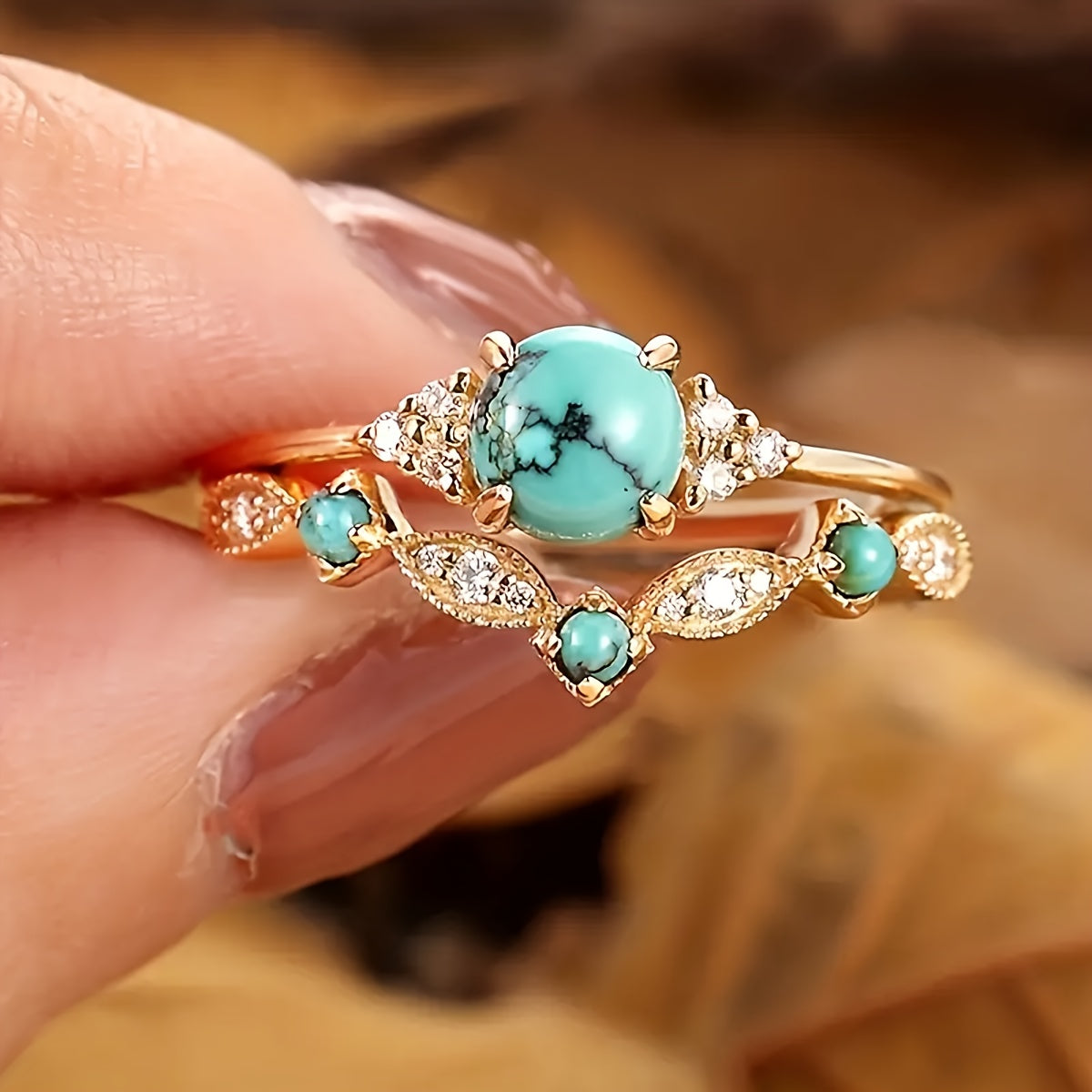 Gouden vintage ring met turquoise bloemmotief
