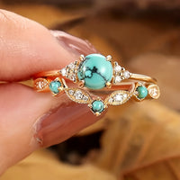 Gouden vintage ring met turquoise bloemmotief