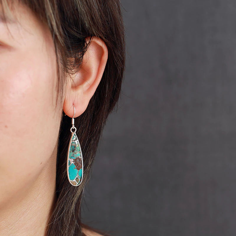 Zilveren oorbellen met turquoise sediment-jaspis