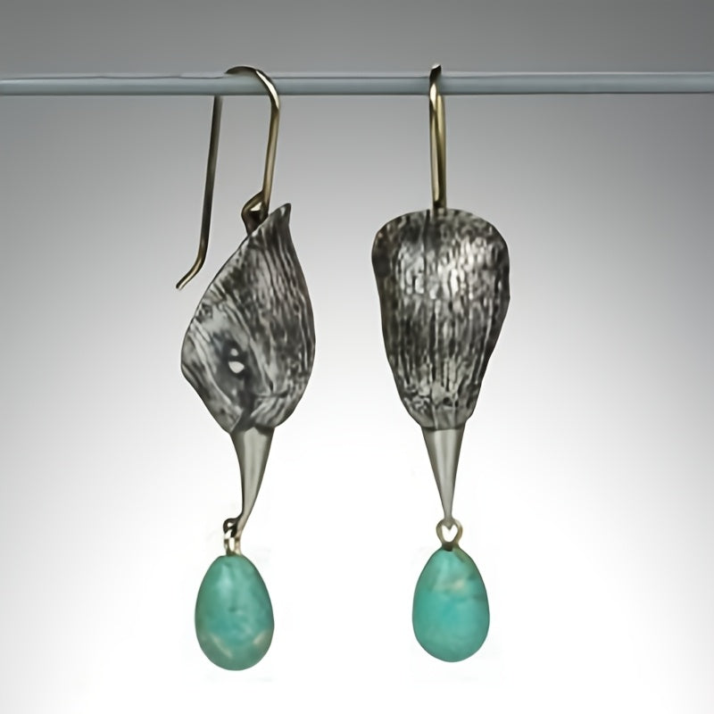 Zilveren oorbellen met gegraveerd blad en turquoise druppel