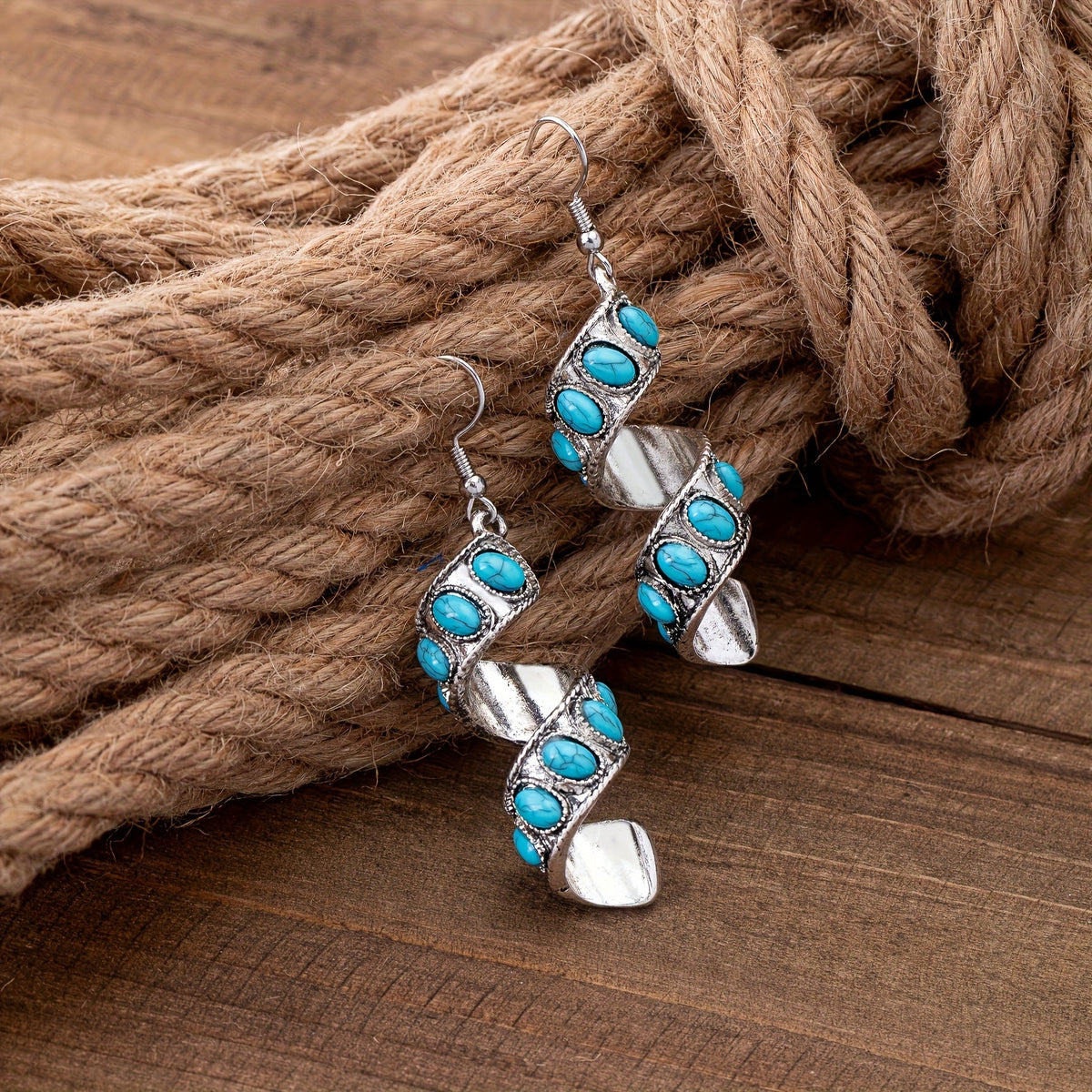 Zilveren oorbellen met spiraal en turquoise