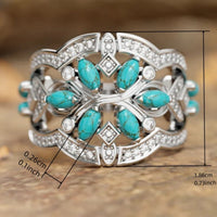 Zilveren ring met turquoise blaadjes en zirkonia