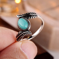 Zilveren ring met veer en turquoise
