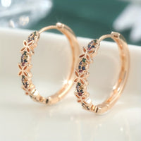 Driekleurige gouden creolen met diamantgeslepen patroon