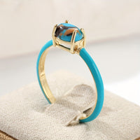 Gouden vintage oorbellen met turquoise stenen