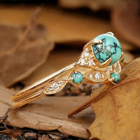 Gouden vintage ring met turquoise bloemmotief