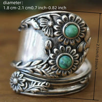Zilveren vintage lepelring met turquoise zonnebloemen