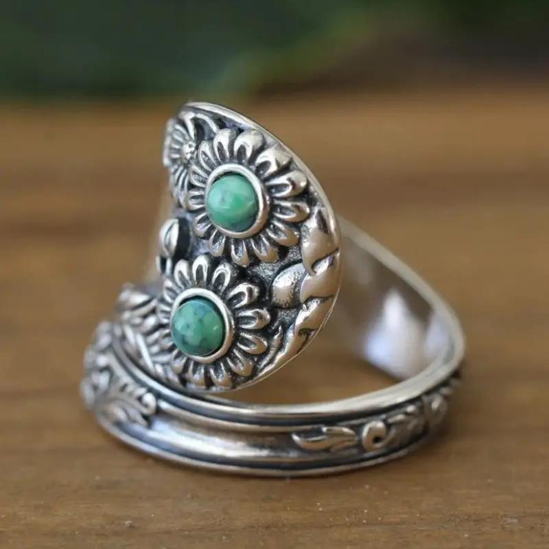 Zilveren vintage lepelring met turquoise zonnebloemen
