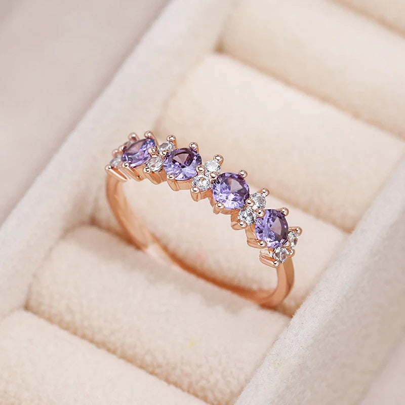 Roségouden ring met paarse en witte zirkonia