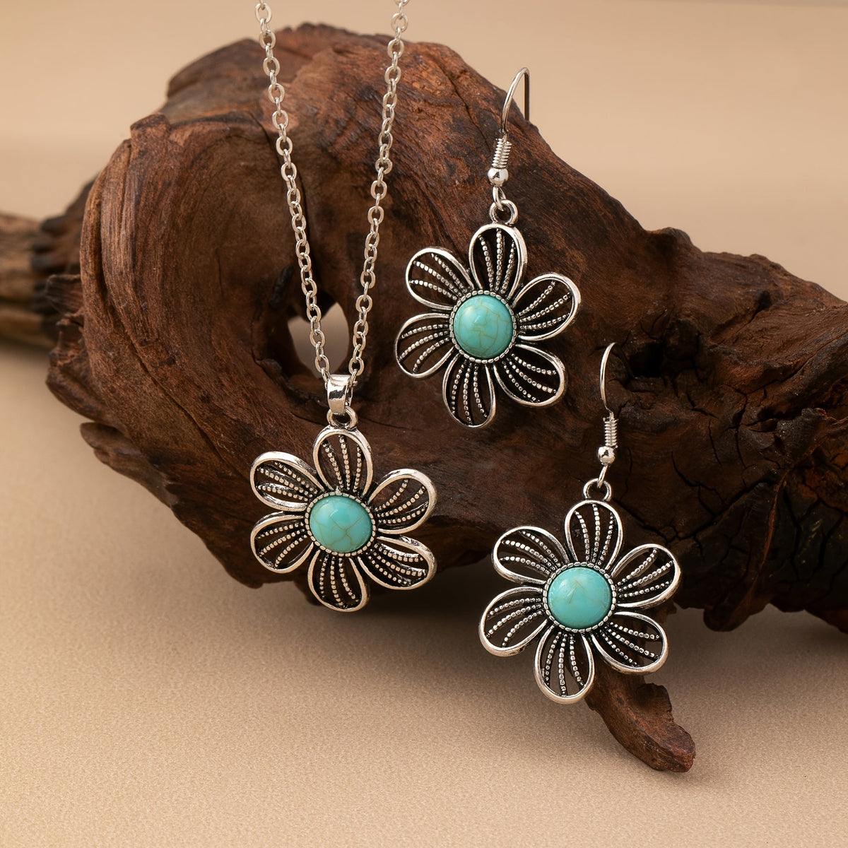 Zilveren bloemenset ketting en oorbellen met turquoise