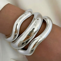 Zilveren chunky golvende bangle-armbandenset