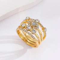 Gouden ringenset in art-decostijl met kristallen