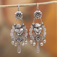 Zilveren vintage oorbellen met bloem en belletjes