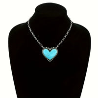 Zilveren tribale oorbellen met turquoise druppels