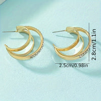 Gouden meerlaagse C-oorbellen met strass detail