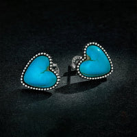 Zilveren hartvormige oorbellen met turquoise