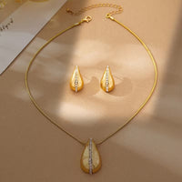 Gouden sieradenset met pavé druppelhanger en oorbellen