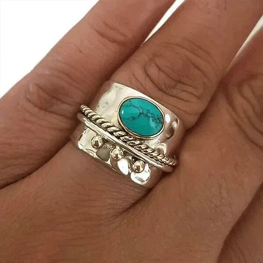 Zilveren brede ring met turquoise en goudaccenten