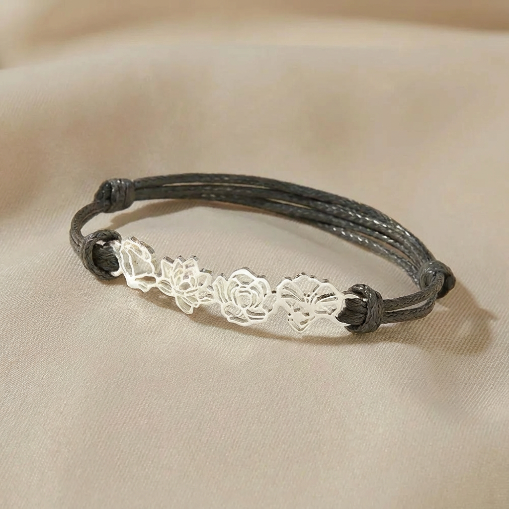 Bruine koord armband met gouden bloemen