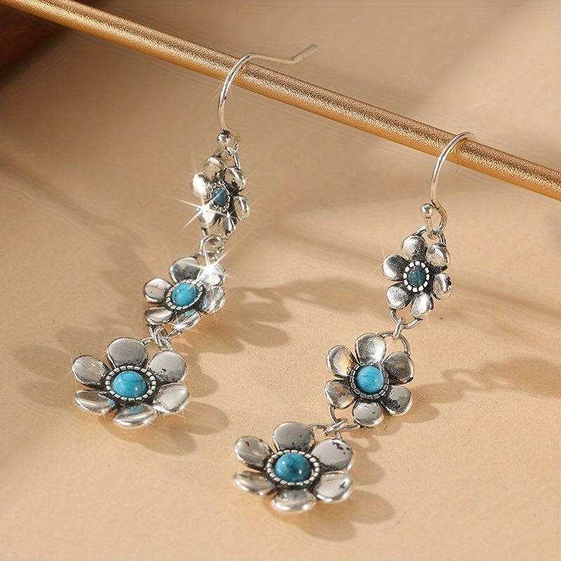 Zilveren bohemian bloemenoorbellen met turquoise