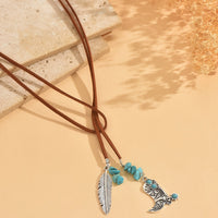 Bohemian ketting met turkooizen kralen en veerhanger