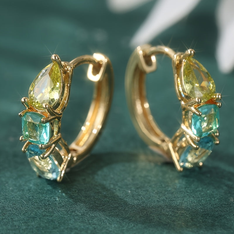 Gouden oorbellen met gele en blauwgroene edelstenen