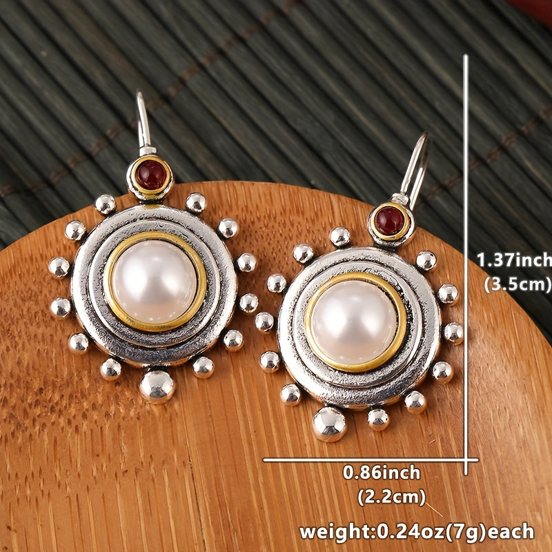 Vintage oorbellen met parel en rode steen