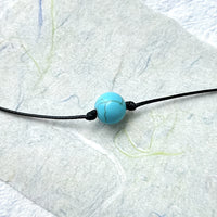 Bohemian lariat ketting van bruin koord met turkooizen kralen
