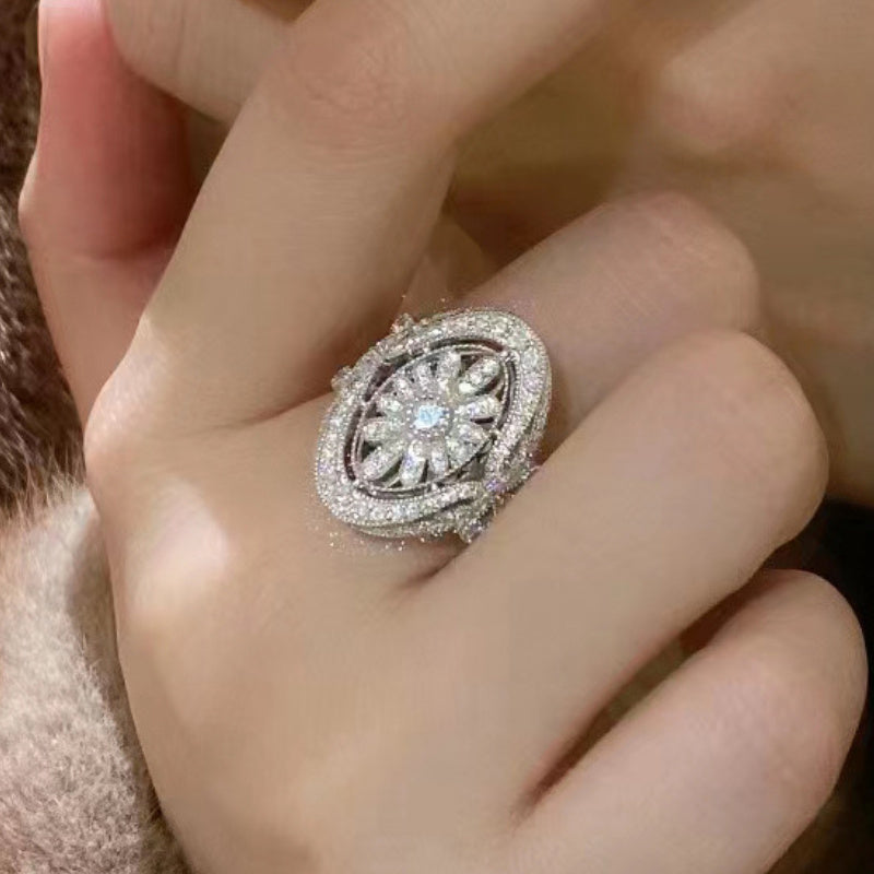 Zilveren vintage ovale ring met zirkonia bloemmotief