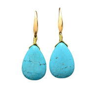 Gouden oorbellen met turquoise druppelsteen