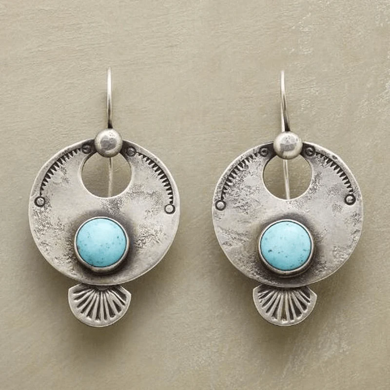 Zilveren oorbellen met turquoise edelsteen