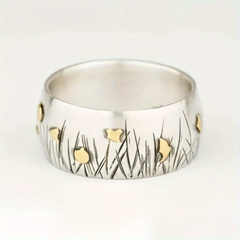 Zilveren vintage ring met gouden vogels en bladeren