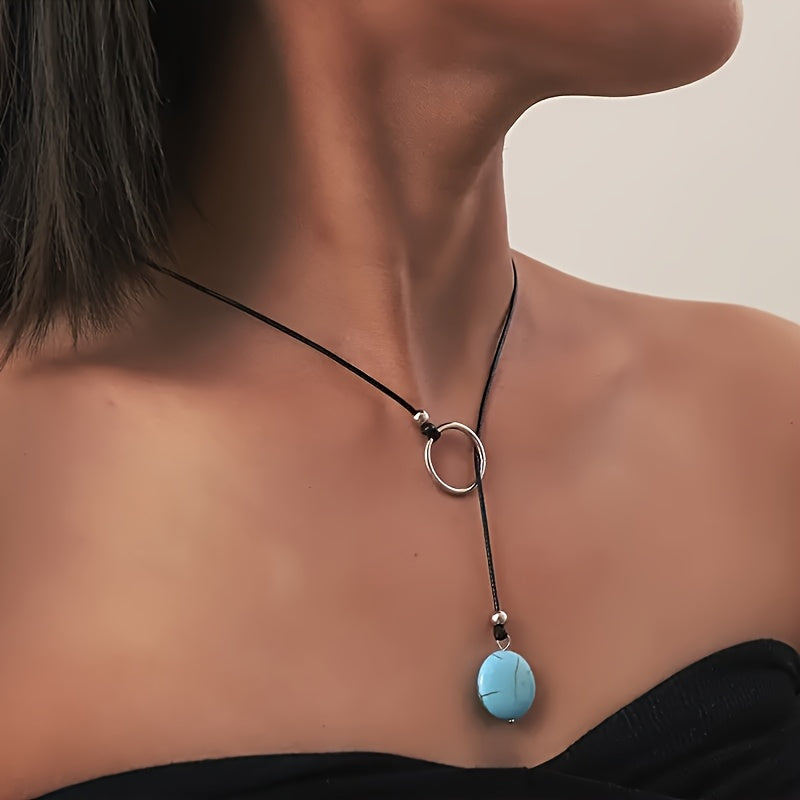 Minimalistische ketting met zilveren ring en turkooizen steen