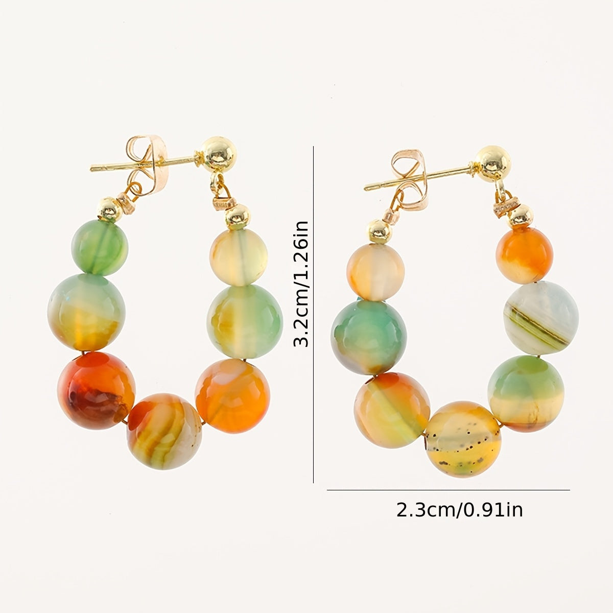 Gouden boho oorbellen met groene en oranje agaatkralen