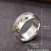 Zilveren vintage ring met gouden vogels en bladeren