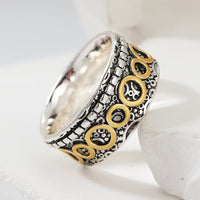 Zilveren vintage ring met gouden cirkelmotief