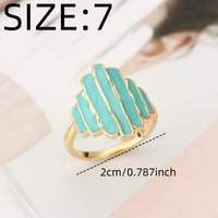 Gouden ring met turquoise geëmailleerde strepen