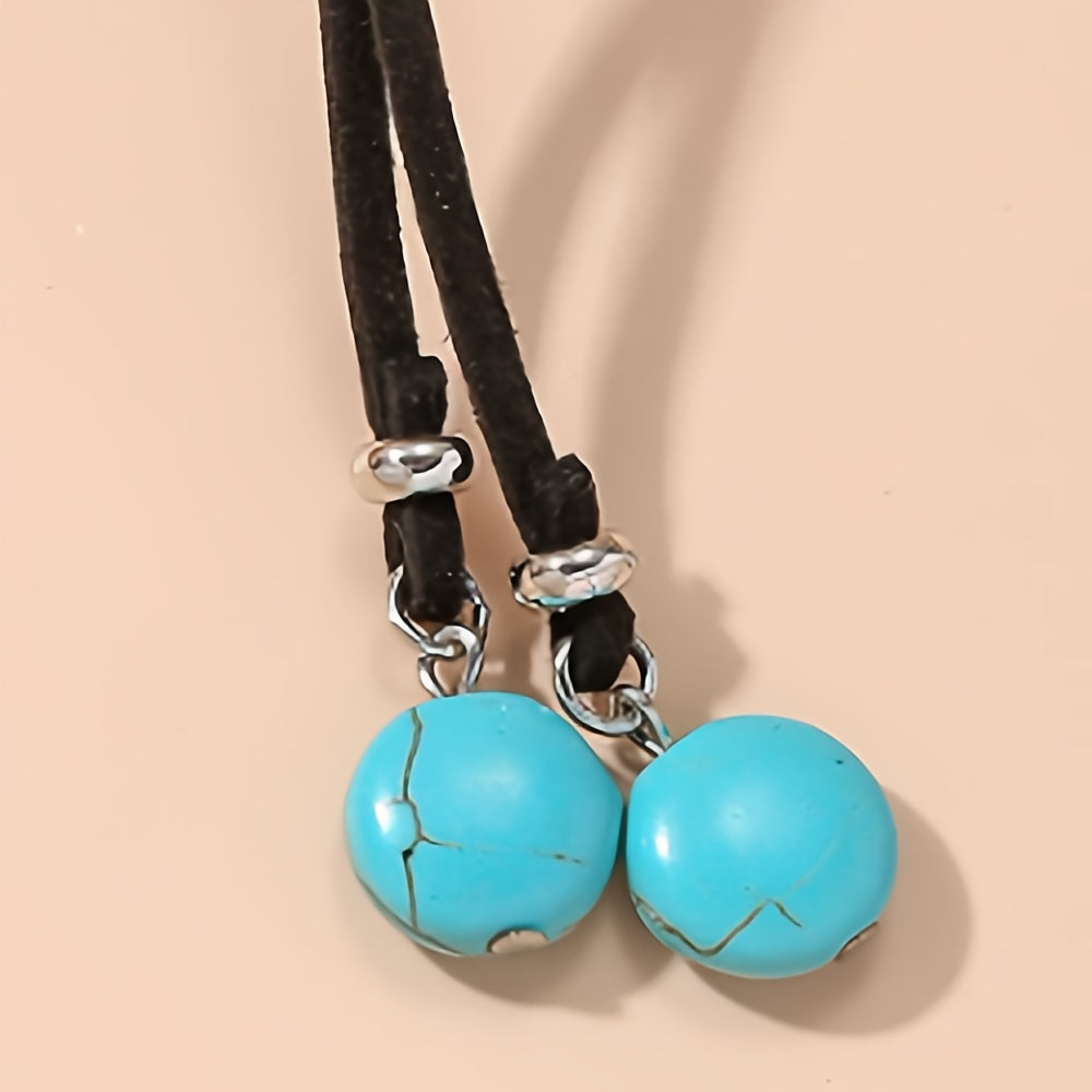 Bohemian lariat ketting van zwart koord met turkooizen kralen