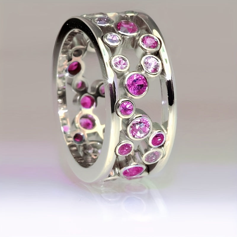 Brede zilveren ring met blauwe en witte zirkonia