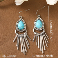 Zilveren bohemian oorbellen met turquoise en franjes