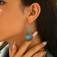 Zilveren bohemian oorbellen met filigraan en turquoise