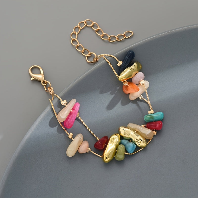 Gouden armband met kleurrijke natuursteen chips