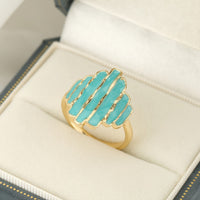 Gouden ring met turquoise geëmailleerde strepen